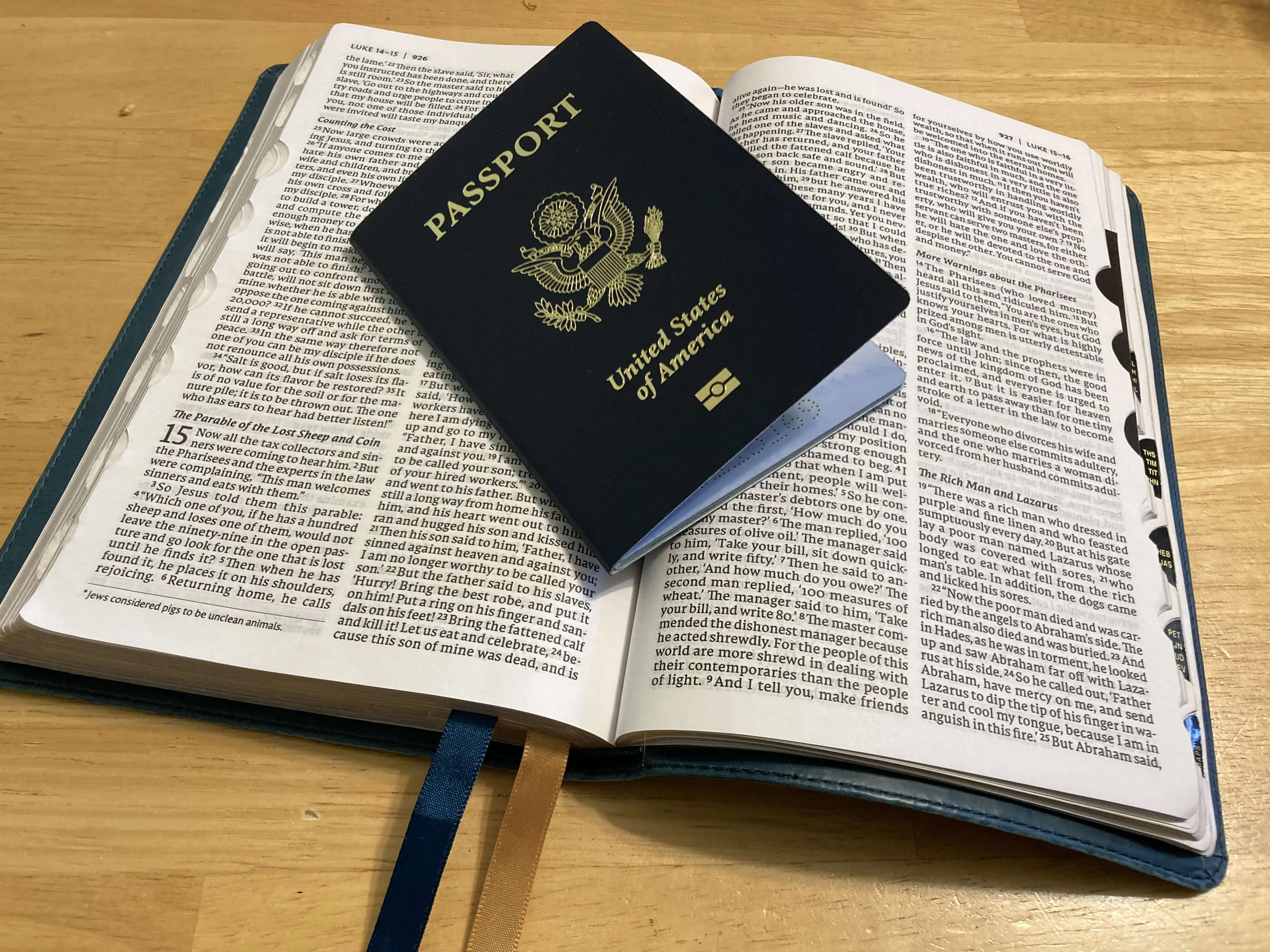 A US passport lying on an open Bible